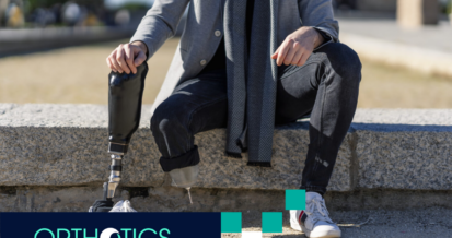 A disabled young man with foot prosthesis sitting outdoor