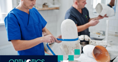 Two prosthetist workers making prosthetic leg while working in laboratory