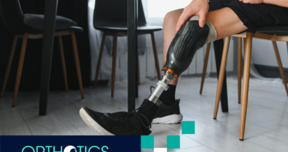 A man wearing prosthetics sitting