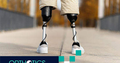 An amputee with a prosthetic legs is standing outdoors