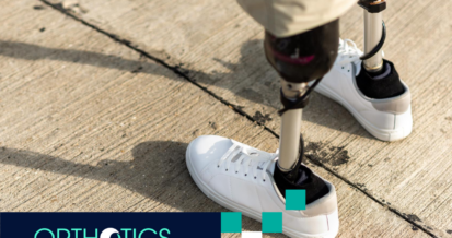 A man with prosthetics walking outdoors