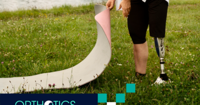 A teen with prosthetics doing yoga outdoors