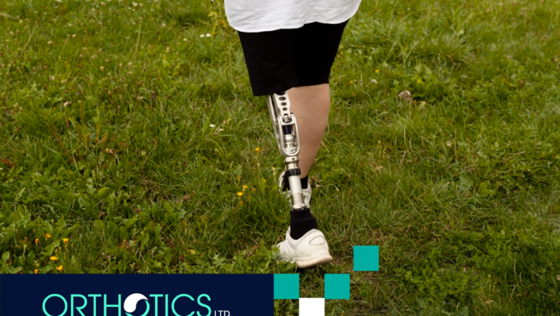 4 Coping with Limb Loss - featured An amputee wearing prosthetics is walking on grass