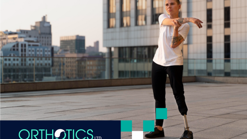 An amputee wearing prosthetic doing outdoor stretches