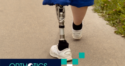 An amputee wearing a prosthetic walking outdoors