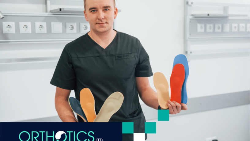 Signs You Might Benefit from Custom Orthotics - featured A guy holding shoe insoles