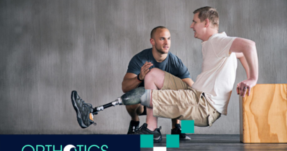 An amputee wearing prosthetics doing stretches with his therapist during occupational therapy