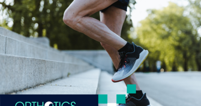 A runner wearing orthotics running up the stairs