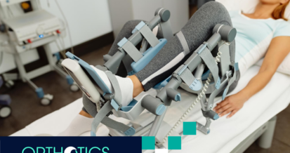 A woman laying on a bed for orthotics fitting