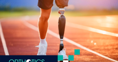 A runner is running in a track wearing prosthetics