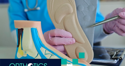 A model of a foot used for clinics and foot insoles held by a doctor