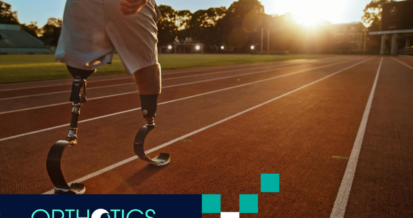 An athlete wearing a prosthetic training in a track